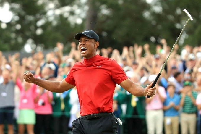 Tiger Woods sau khi đăng quang tại Masters ngày 14/4/2019. Ảnh: AFP