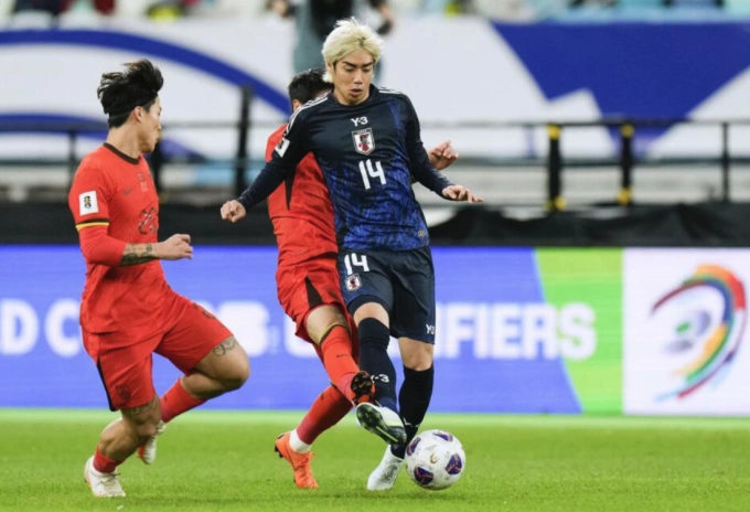 Junya Ito tỏa sáng với hai pha kiến tạo trong lần trở lại tuyển Nhật Bản sau hơn 1 năm vắng mặt. Ảnh: Kyodo News