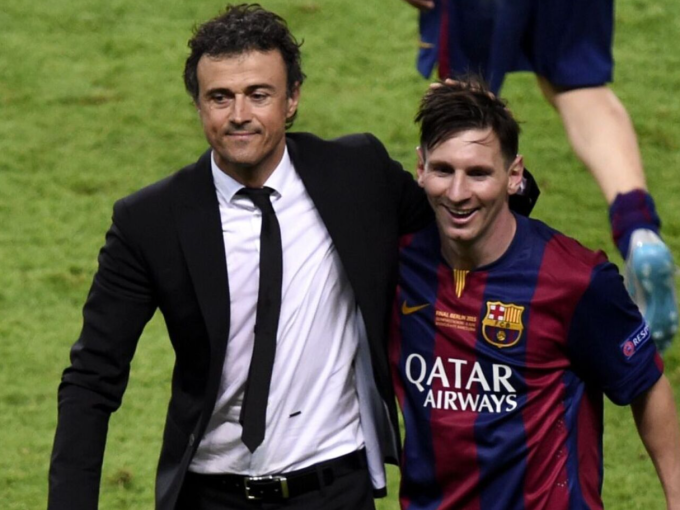 HLV Luis Enrique (trái) và Lionel Messi thời còn cùng phụng sự Barca. Ảnh: AFP