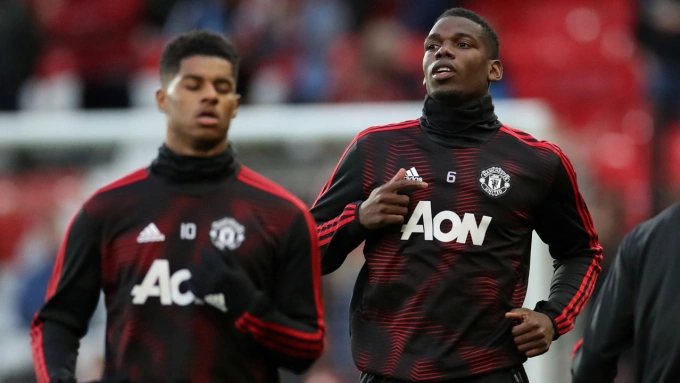 Rashford (trái) và Pogba khi còn khoác áo Man Utd năm 2019. Ảnh: Reuters