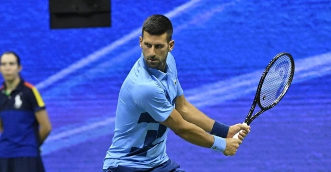 Djokovic tại Mỹ Mở rộng năm ngoái, nơi anh thua Popyrin ở vòng ba trên sân Arthur Ashe, New York. Ảnh: Reuters