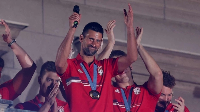 Djokovic phát biểu trong lễ mừng công Olympic 2024 của đoàn thể thao Serbia ở Tòa thị chính Belgrade hôm 13/8 năm ngoái. Ảnh: Reuters