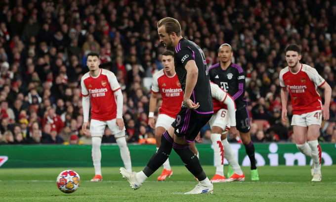 Harry Kane với cú sút phạt đền trong trận Bayern gặp Arsenal ở lượt đi tứ kết Champions League trên sân Emirates, thành phố London, Vương quốc Anh ngày 9/4/2024. Ảnh: Reuters