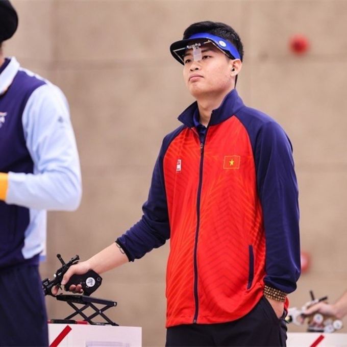 Xạ thủ Phạm Quang Huy thi đấu tại ASIAD 19 ở Trung Quốc năm 2023. Ảnh: ISSF