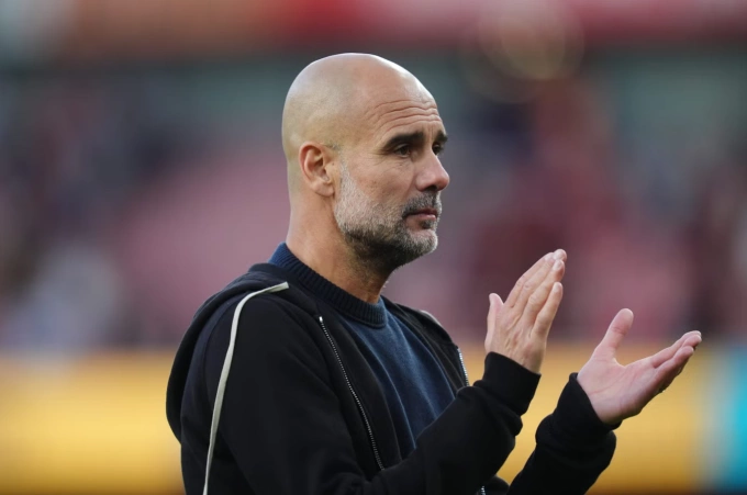 HLV Pep Guardiola phản ứng sau trận Man City hòa Arsenal 1-1 ở vòng năm Ngoại hạng Anh trên sân Emirates, London, Anh ngày 21/9/2025. Ảnh: PA