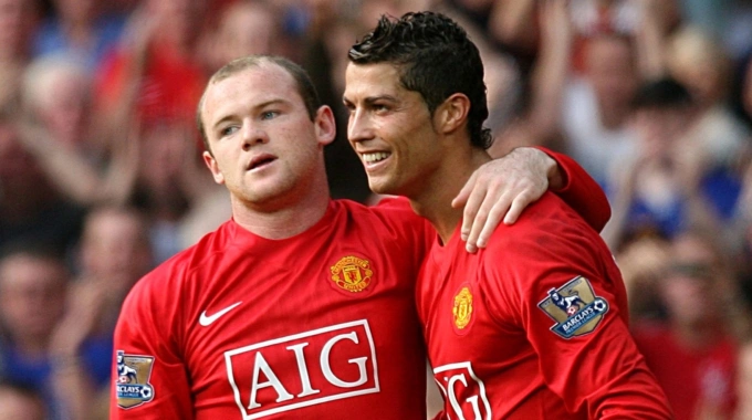 Rooney (trái) và Ronaldo khi còn là đồng đội tại Man Utd giai đoạn 2004-2009. Ảnh: PA