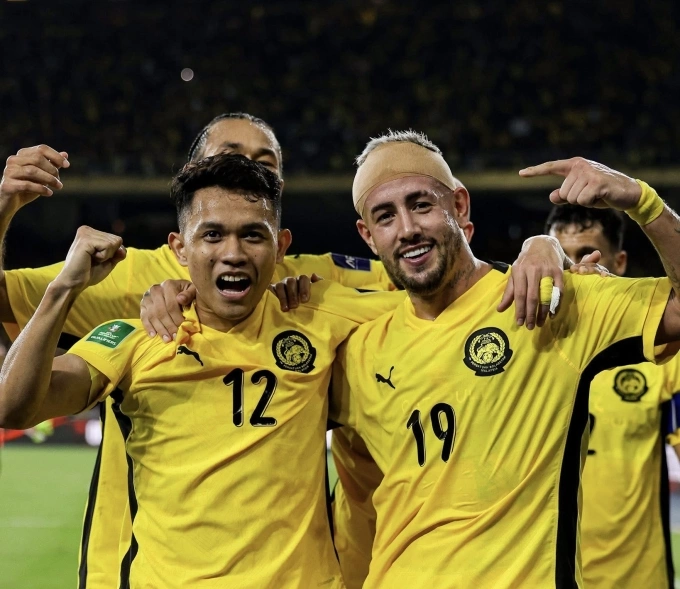 Arif Aiman (số 12) ăn mừng trong trận Malaysia thắng Việt Nam 4-0 ở lượt hai bảng F vòng loại cuối Asian Cup 2027, trên sân Bukit Jalil, Malaysia ngày 10/6/2025. Ảnh: Malaysia NT