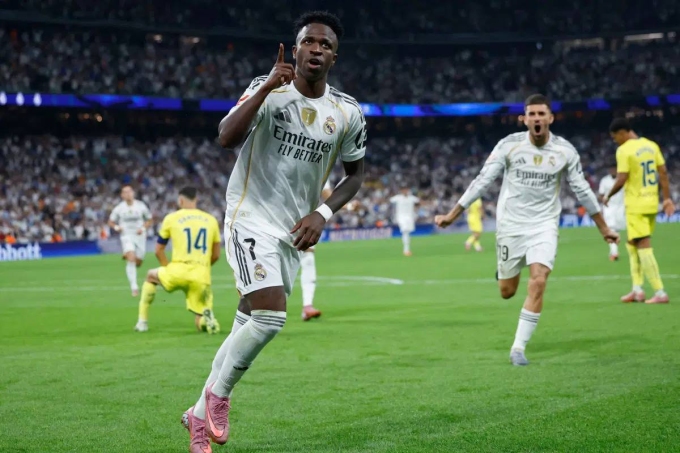 Vinicius mừng bàn trong trận Real 3-1 Villarreal ở vòng tám La Liga tối 4/10. Ảnh: AFP