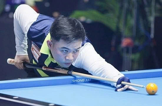 Bao Phương Vinh trong trận gặp David Pennor ở World Cup carom 3 băng tại Antwerp, Bỉ ngày 9/10/2025. Ảnh: Maeil