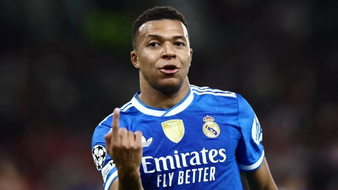 Mbappe mừng bàn trong trận Olympiakos 3-4 Real ở lượt thứ năm vòng bảng Champions League tối 26/11 Mbappe ăn mừng trong trận Real thắng Olympiakos 4-3 ở lượt thứ năm vòng bảng Champions League tối 26/11