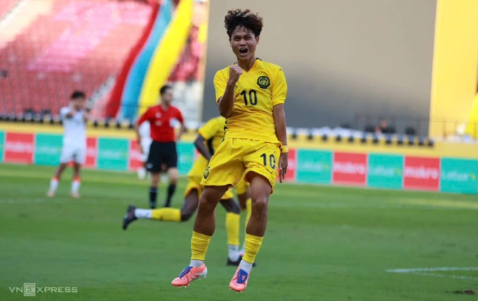 Haykal Danish ăn mừng bàn gỡ hòa cho Malaysia trong trận thắng Lào. Ảnh: Đức Đồng