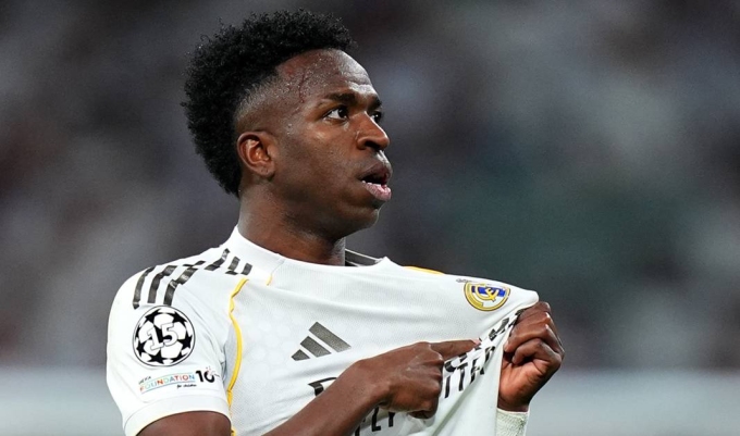 Vinicius mừng bàn ấn định chiến thắng trận Real thắng Benfica 2-1 ở lượt về vòng play-off Champions League tối 25/2 Vinicius ăn mừng sau bàn thắng quyết định giúp Real vượt qua Benfica