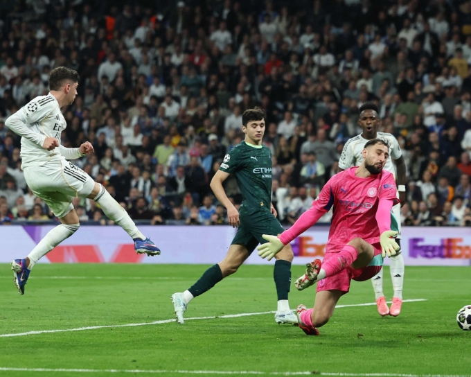 Valverde ghi bàn nâng tỷ số lên 3-0 cho Real trong trận thắng Man City ở lượt đi vòng 1/8 Champions League ngày 11/3/2026. Ảnh: Reuters Valverde ghi bàn nâng tỷ số lên 3-0 cho Real trong trận thắng Man City ở lượt đi vòng 1/8 Champions League ngày 11/3/2026