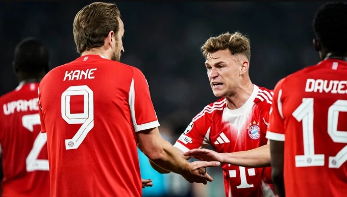 Joshua Kimmich (phải) mừng bàn cùng Harry Kane. Kimmich ăn mừng bàn thắng cùng Harry Kane
