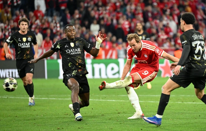 Harry Kane ghi bàn trong trận Bayern hòa PSG 1-1 tại Allianz Arena Harry Kane (áo đỏ) ghi bàn trong trận Bayern hòa PSG 1-1 ở lượt về bán kết Champions League trên sân Allianz, Munich, Đức ngày 6/5/2026.