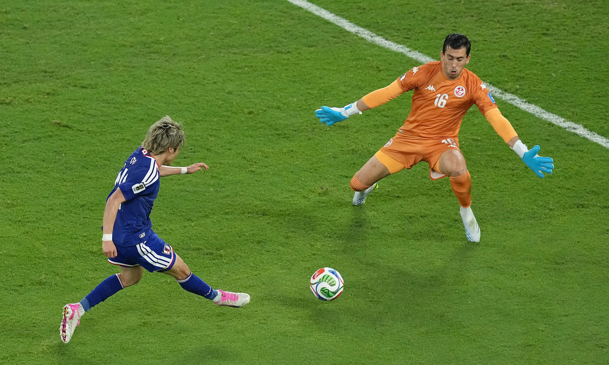 Japan sets Asian World Cup scoring record in 4-0 win over Tunisia