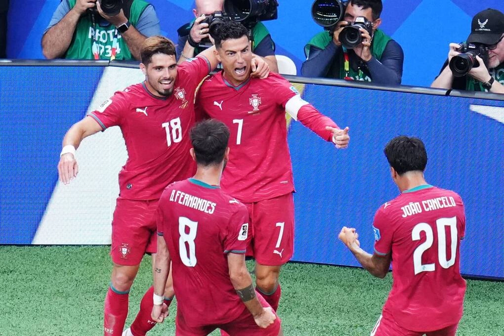 Neto (left) celebrates goal with Ronaldo (number 7) and teammates in Portugal 5-0 Uzbekistan match, Group K World Cup 2026, in Houston, US on June 23. Photo: AP