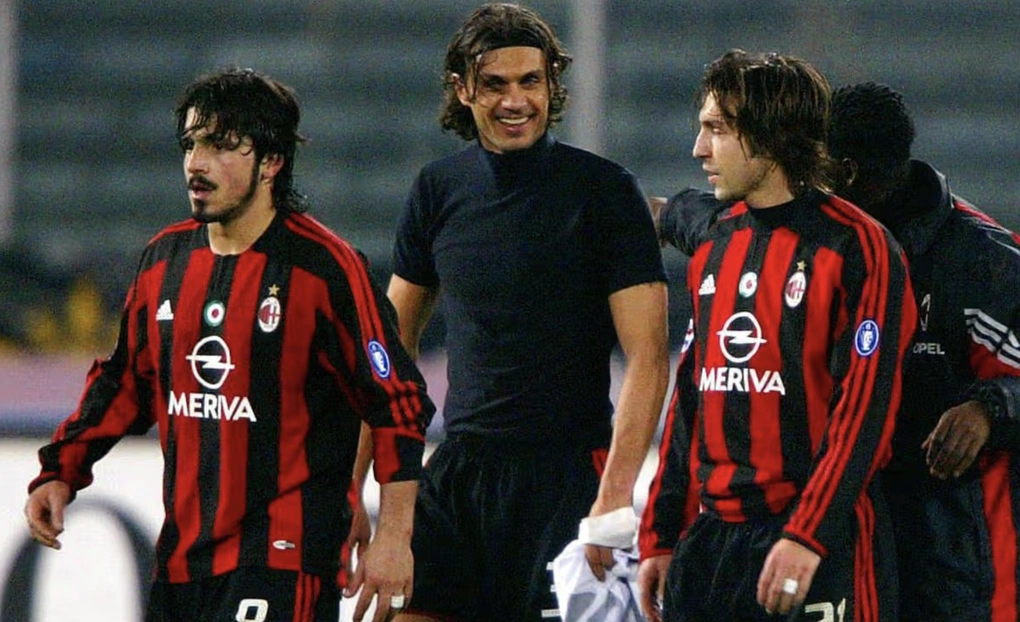 Gennaro Gattuso, đội trưởng Paolo Maldini, Andrea Pirlo ăn mừng sau trận đấu Serie A giữa Milan và Juventus tại Turin ngày 14/3/2004. Gennaro Gattuso, đội trưởng Paolo Maldini, Andrea Pirlo ăn mừng sau trận đấu Serie A giữa Milan và Juventus tại Turin ngày 14/3/2004.