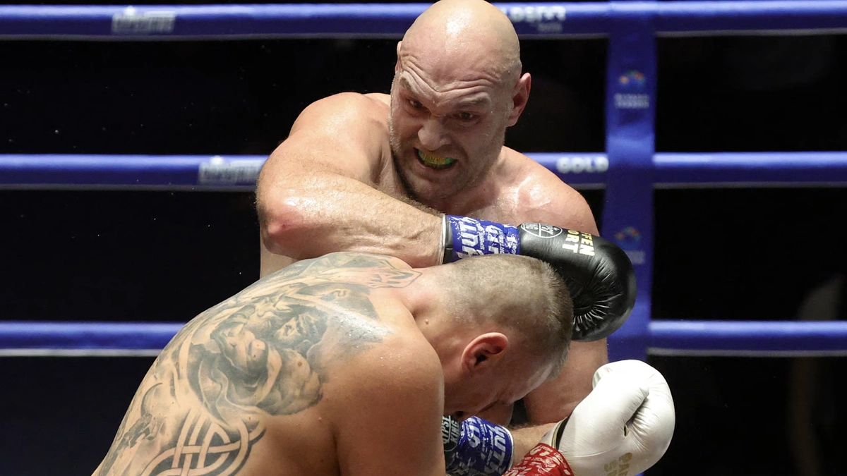 Tyson Fury hôn đối thủ trong trận thắng knock-out